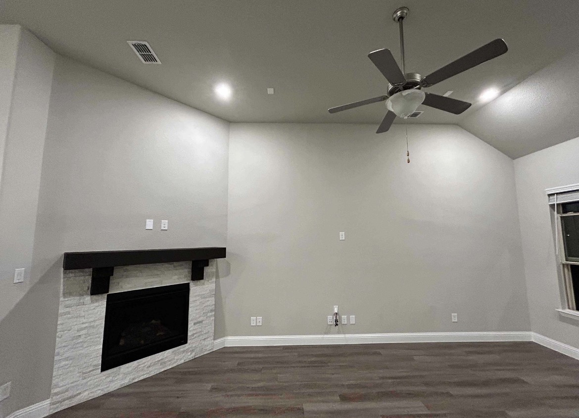 Painted living room with fireplace